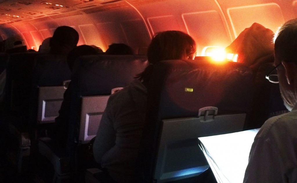 dawn light shines into airliner cabin