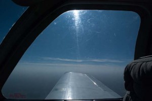Looking over right wing of aircraft in flight