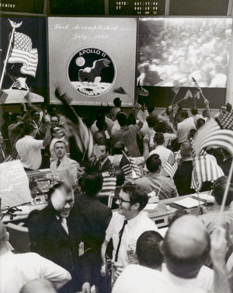 NASA mission controllers celebrate