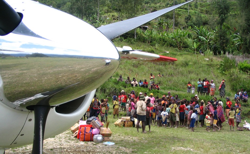 stopped aircraft propeller frames group of jungle residents
