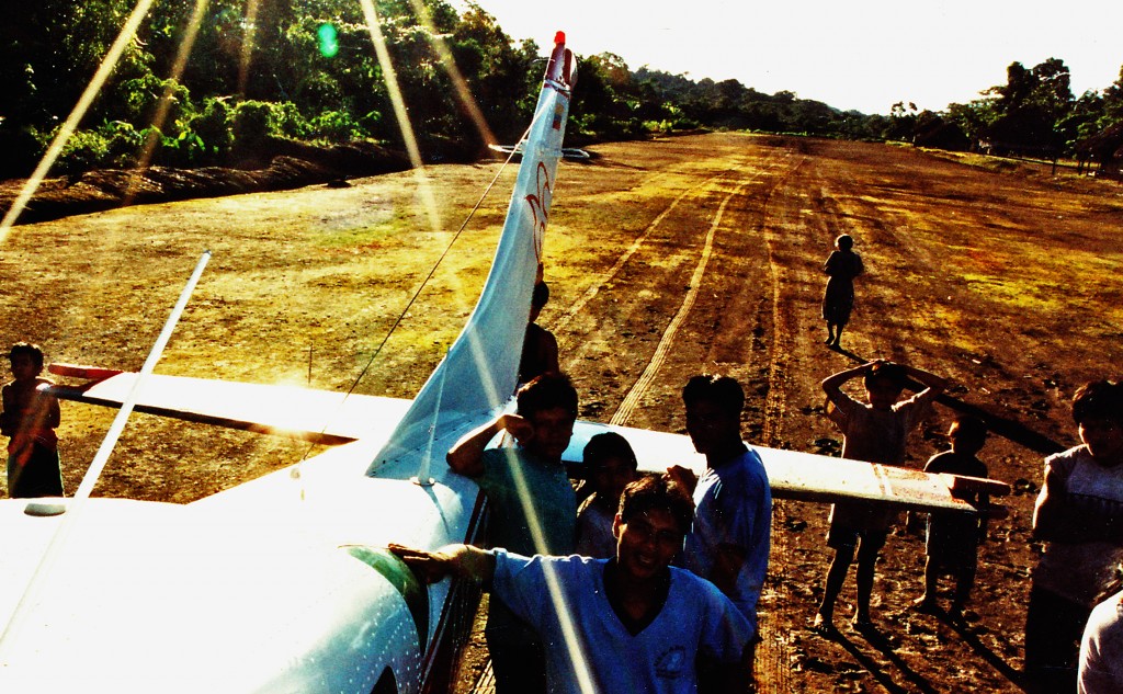 Airplane at jungle airstrip