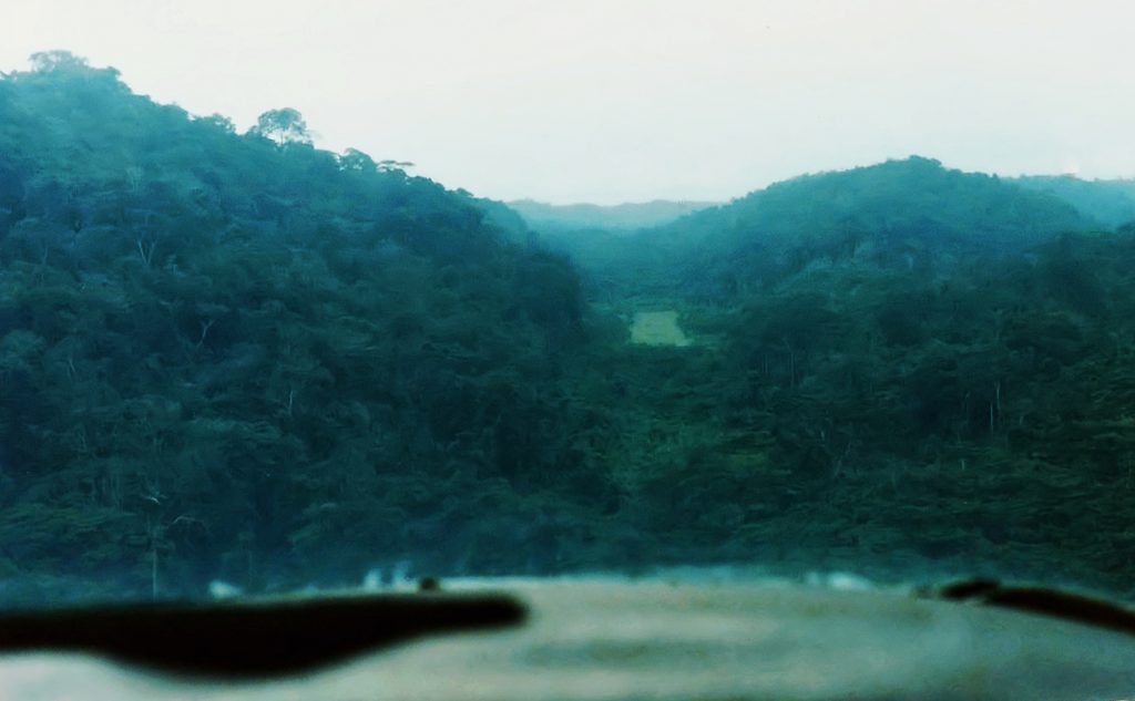 Aviation & Space Writer, James Rush Manley on final approach to a small jungle airstrip set between hills