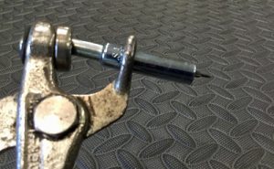 James Rush Manley - Aviation & Space Writer looks at cleco pliers holding a cleco