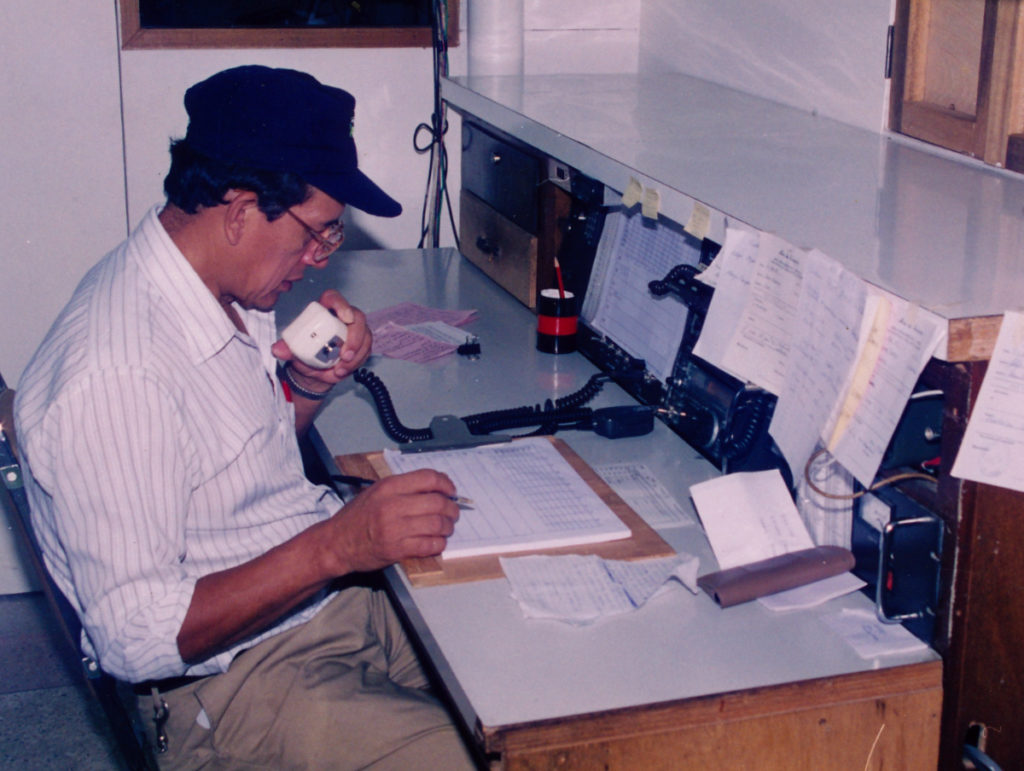 Lucas working as a dispatcher, using the radio to confirm our aircrafts' positions and status.