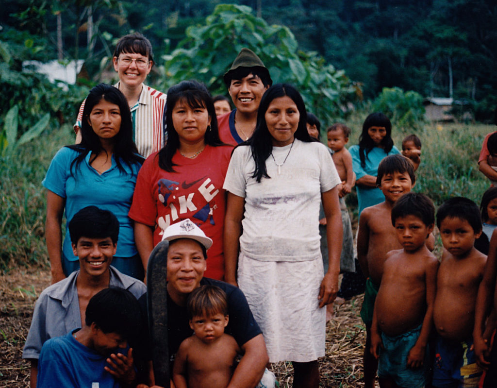 Miriam (upper left) in her element, working in a Lowland Quichua village. 